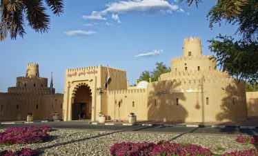 Traditional fort in Al Ain under blue sky